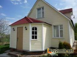 Дом обшитый виниловым сайдингом