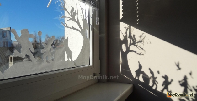 Украшение окон к Новому году вытынанками